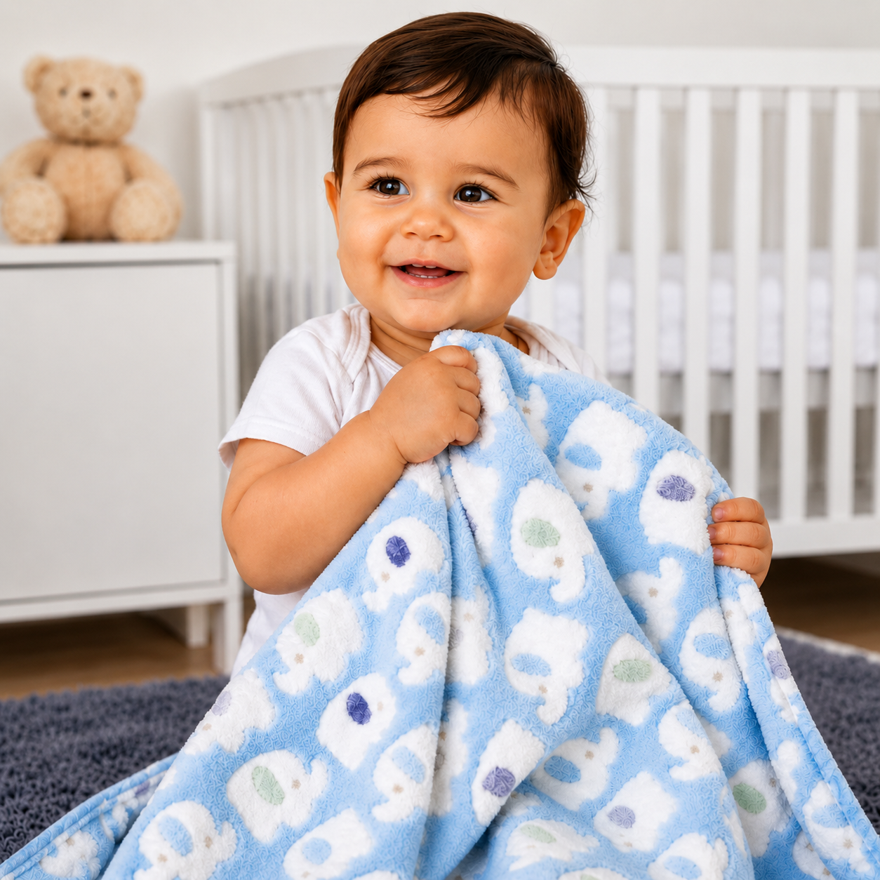 Couverture bébé bleue bébé assis